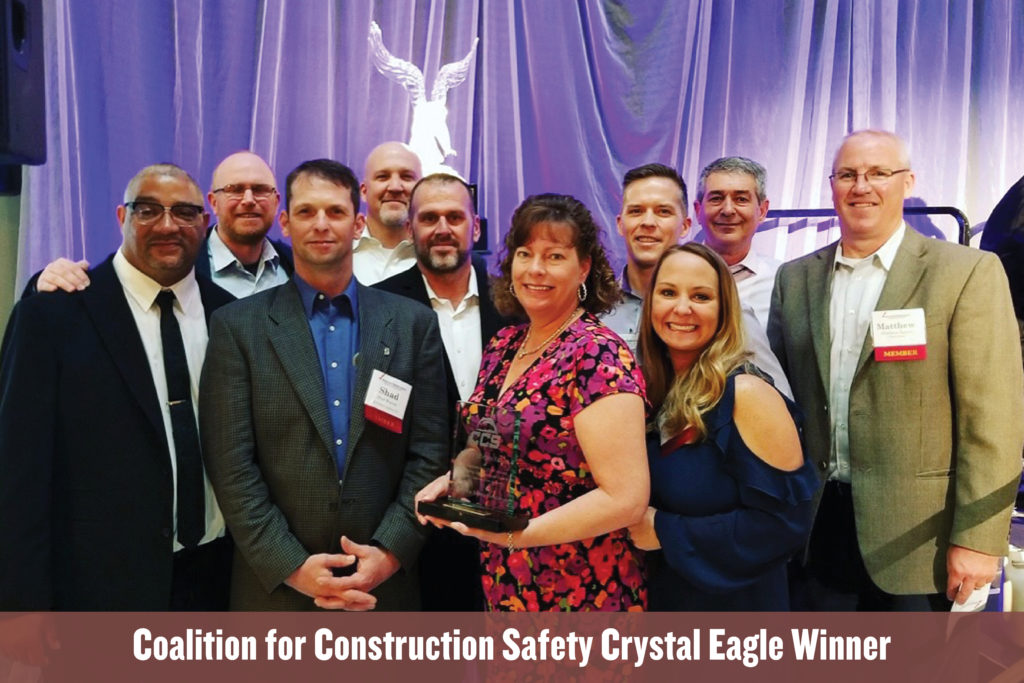 Shiel Sexton accepts the Coalition for Construction Safety's Crystal Eagle Award.