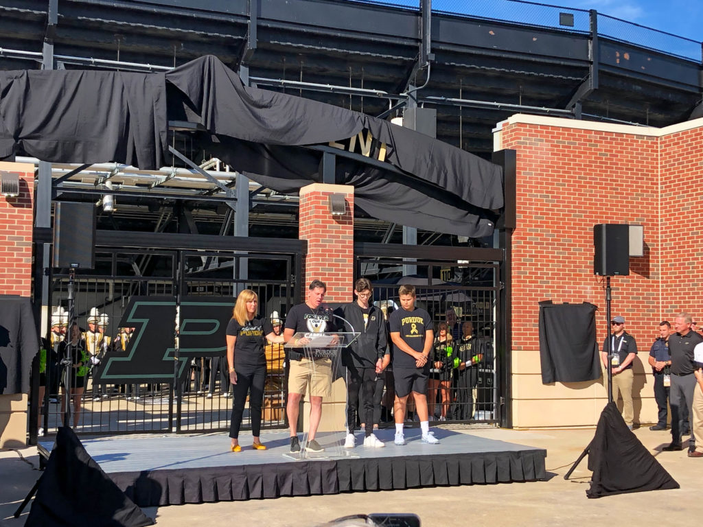 The Trent family speaks at the Tyler Trent Student Gate dedication ceremony on September 7.